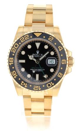 Rolex GMT-Master II in 18 Karat Gelbgold im Full-Set, ungetragen, alle original Rolex Aufkleber vorhanden