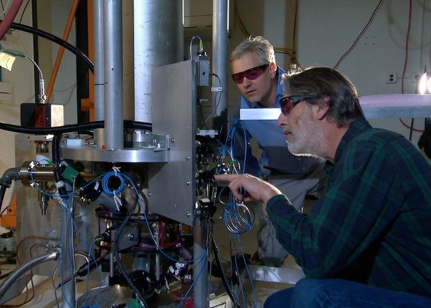 NIST physicists Steve Jefferts and Tom Heavner with the NIST-F2, standard for civilian timing in the U.S. - the most accurate clocks